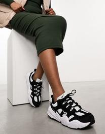 Προσφορά Nike Tech Hera trainers in white and black για 60€ σε Asos