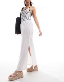 Προσφορά COLLUSION beach linen midi skirt with bow in white για 19,99€ σε Asos