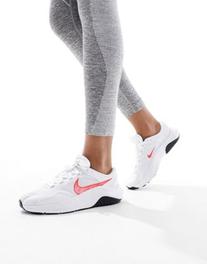 Προσφορά Nike Training Legend Essential 3 trainers in white and crimson για 64,99€ σε Asos