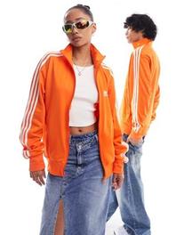 Προσφορά Adidas Originals unisex firebird track jacket in orange για 65€ σε Asos