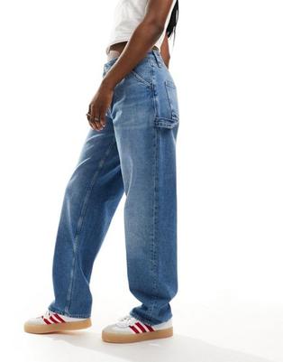 Προσφορά Calvin Klein Jeans 90s straight carpenter jeans in light wash για 159,99€ σε Asos