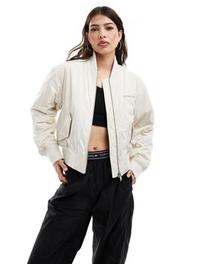 Προσφορά Tommy Jeans classic bomber jacket in off white για 75€ σε Asos