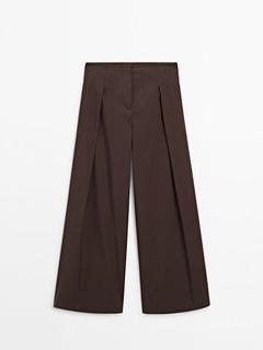 Προσφορά Φαρδύ παντελόνι από ποπλίνα με λεπτομέρεια πιέτες - Limited Edition για 129€ σε Massimo Dutti